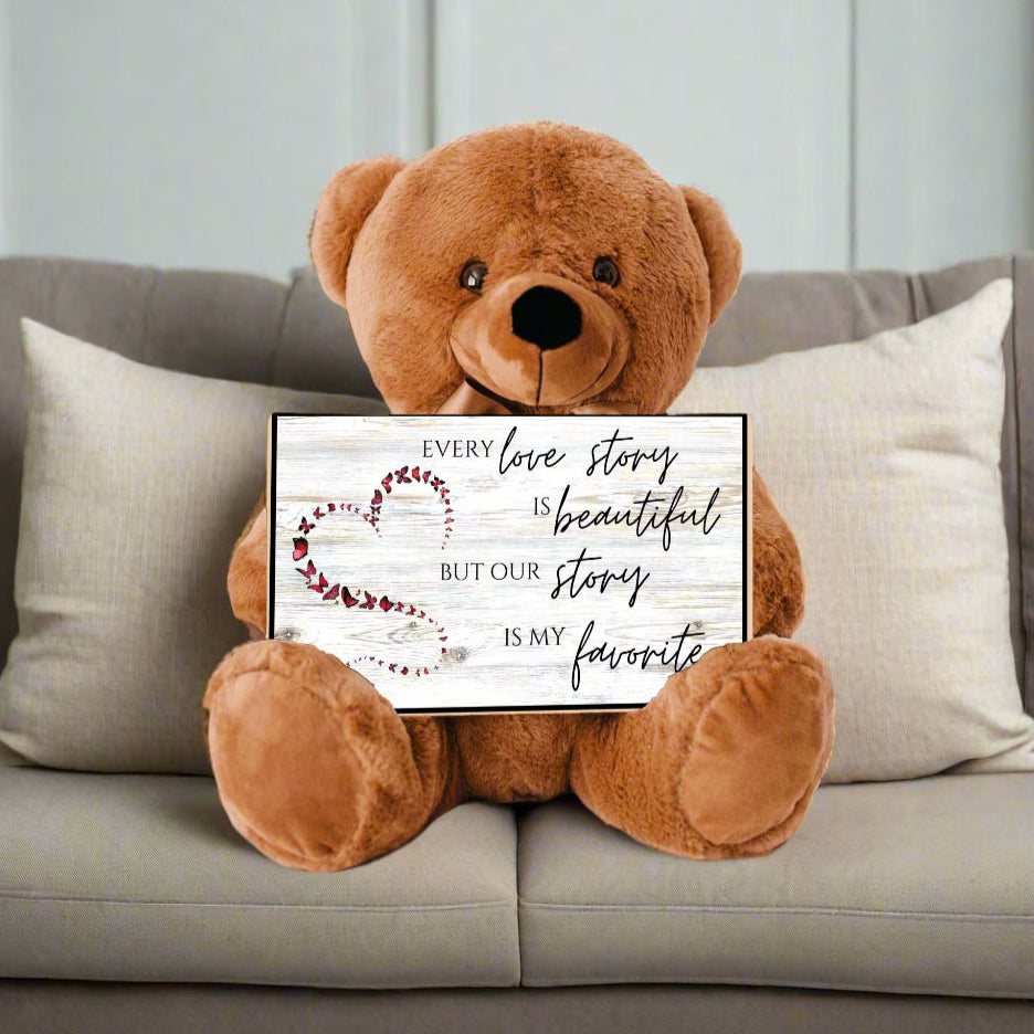 Soft Teddy Bear holding a special Love Story sign message for Valentine, Anniversary, Birthday, a gift of love for her or him
